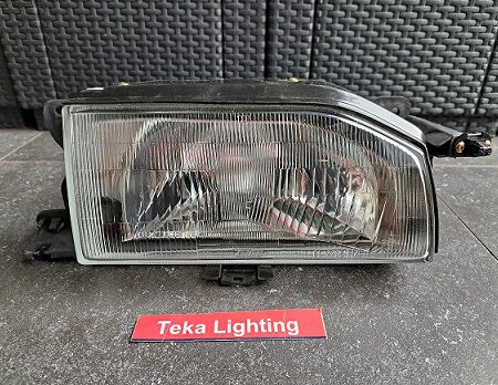 Mazda 323 BF Familia / Scheinwerfer / Headlight / Phare / Esuse 2205